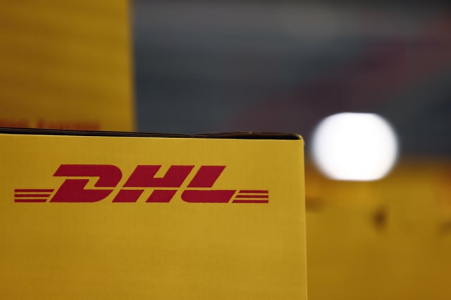 Delivery packages are seen inside the new DHL Express hub of German postal and logistics group Deutsche Post DHL at the Roissy Charles de Gaulle airport in Tremblay-en-France near Paris, France, October 5, 2021. REUTERS/Sarah Meyssonnier/File Photo