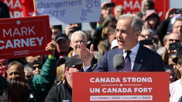 Mark Carney addresses a campaign rally ahead of voting beginning in the Canadian elections as he seeks a second term as Prime Minister.