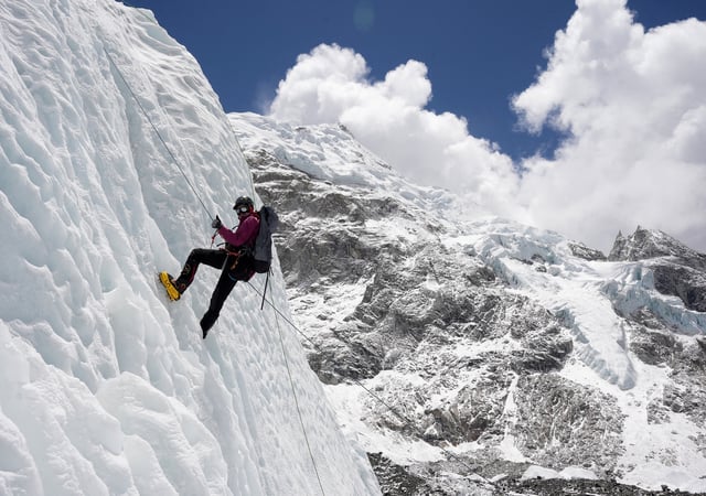 A mountaineer holds on to the rope during an ice climbing session at Everest base camp, Nepal April 15, 2025. REUTERS/Purnima Shrestha