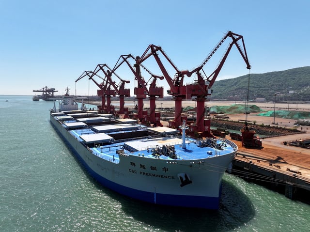 An ocean-going cargo ship moored in Lianyungang Port to unload iron ore in Lianyungang City, Jiangsu Province, China on April 28, 2025.