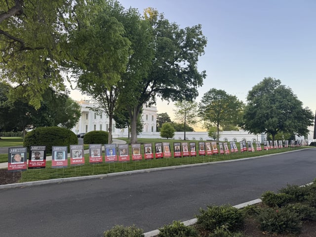 An image of the posters on the White House lawn shared on X by Trump official Kaelan Dorr.
