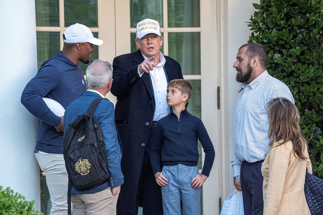 Barkley and Trump talk at the White House.
