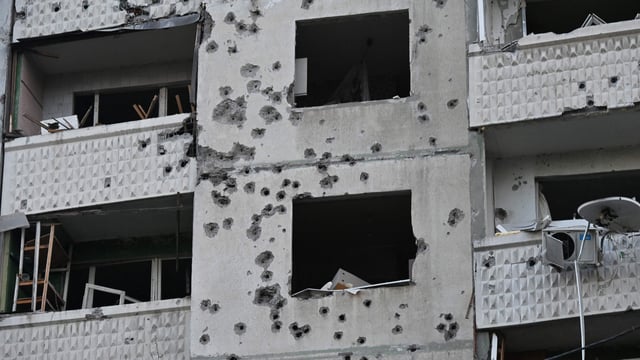 A damaged residential building following a missile attack in Kharkiv, amid the Russian invasion of Ukraine.