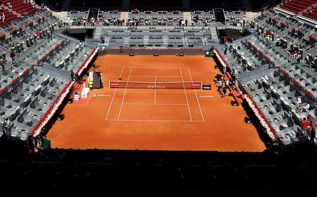 Tennis - Madrid Open - Park Manzanares, Madrid, Spain - April 28, 2025 General view of an empty court as the matches get suspended due to a power outage REUTERS/Violeta Santos Moura