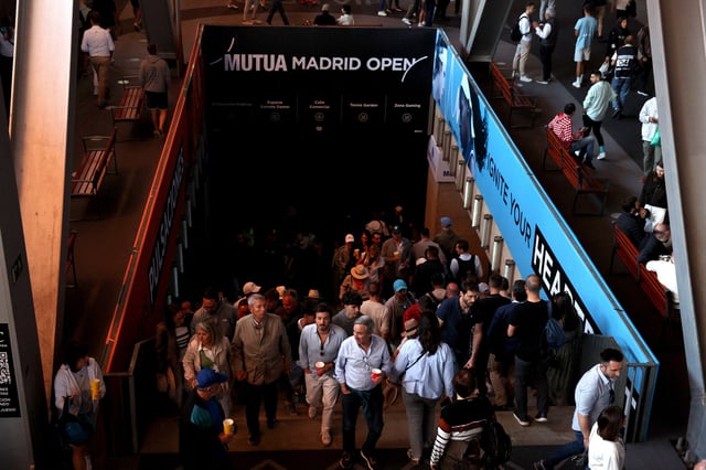 Tennis - Madrid Open - Park Manzanares, Madrid, Spain - April 28, 2025 Fans are seen after the matches get suspended due to a power outage REUTERS/Violeta Santos Moura