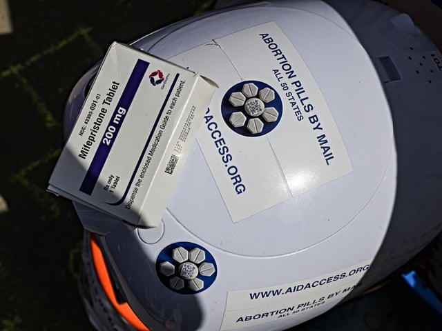 A box of mifepristone pills on a robot outside the US Supreme Court in Washington, DC, US, on Tuesday, March 26, 2024. The court on Tuesday will hear oral arguments on whether to limit the use of mifepristone, one of two drugs most commonly used for abortions in the US. Photographer: Valerie Plesch/Bloomberg