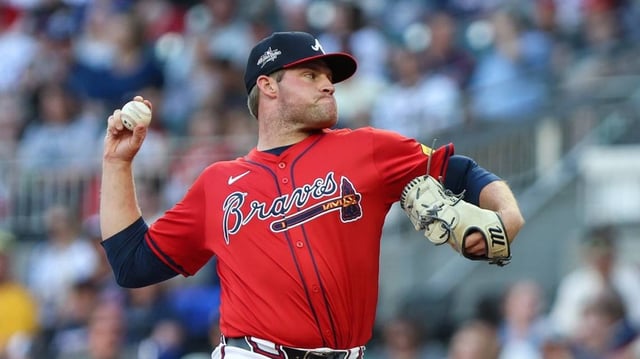 Apr 18, 2025; Cumberland, Georgia, USA; Atlanta Braves pitcher Bryce Elder (55) pitches against the Minnesota Twins during the first inning at Truist Park. Mandatory Credit: Jordan Godfree-Imagn Images