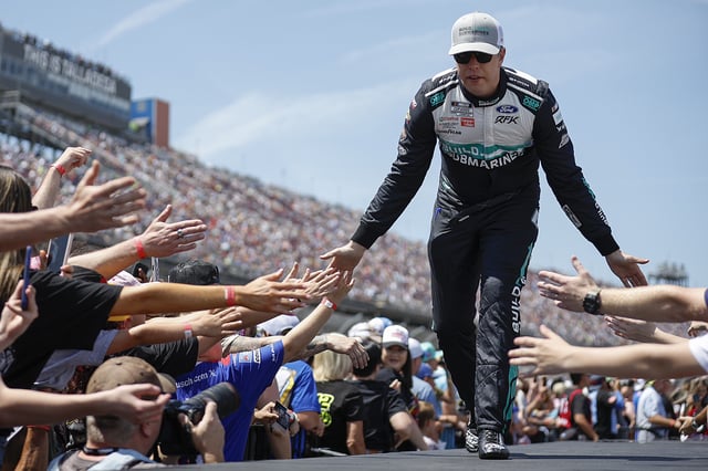 Brad Keselowski, driver of the #6 BuildSubmarines.com Ford, greets fans as he walks onstage during driver intros prior to the NASCAR Cup Series Jack Link&#39;s 500 at Talladega Superspeedway on April 27, 2025 in Talladega, Alabama.