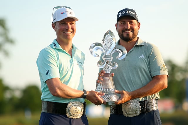 Ben Griffin of the United States and Andrew Novak of the United States pose for a photo with the trophy on day four of the Zurich Classic of New Orleans on April 27, 2025 in Avondale, Louisiana.