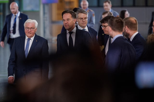 German President Frank-Walter Steinmeier and NATO Secretary General Mark Rutte react on the day of the ceremony to mark the 70th anniversary of Germany joining NATO, in the North Atlantic Treaty Organisation (NATO) headquarters in Brussels, Belgium, 28 April 2025.     OLIVIER MATTHYS/Pool via REUTERS