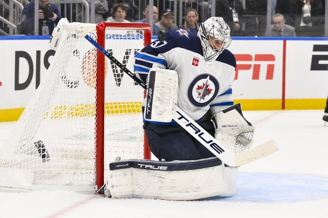 Apr 24, 2025; St. Louis, Missouri, USA; Winnipeg Jets goaltender Connor Hellebuyck (37) defends the net against the St. Louis Blues during the second period in game three of the first round of the 2025 Stanley Cup Playoffs at Enterprise Center. Mandatory Credit: Jeff Curry-Imagn Images/File Photo