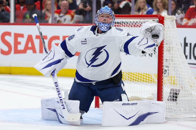 Apr 26, 2025; Sunrise, Florida, USA; Tampa Bay Lightning goaltender Andrei Vasilevskiy (88) makes a save against the Florida Panthers in the first period during game three of the first round of the 2025 Stanley Cup Playoffs at Amerant Bank Arena. Mandatory Credit: Nathan Ray Seebeck-Imagn Images/File Photo