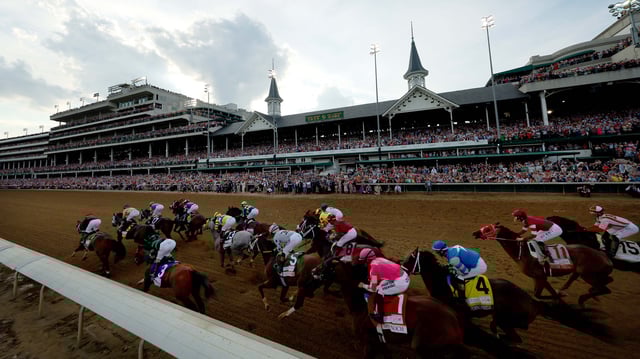 The field heads into the first turn during the 150th running of the Kentucky Derby at Churchill Downs on May 4, 2024 in Louisville, Kentucky.