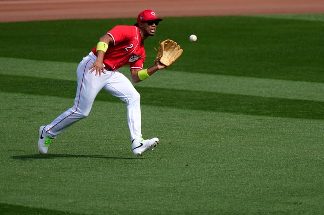 Feb 25, 2024;  Goodyear, Ariz USA; Cincinnati Reds outfielder Jose Barrero (2) makes a catch in the second inning during a MLB spring training baseball game against the Los Angeles Angelsat Goodyear Ballpark. Mandatory Credit: Kareem Elgazzar-USA TODAY Sports via The Cincinnati Enquirer/File Photo