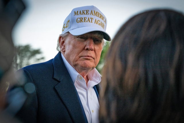 President Donald Trump speaks to reporters after arriving on the South Lawn of the White House on April 27, 2025.  