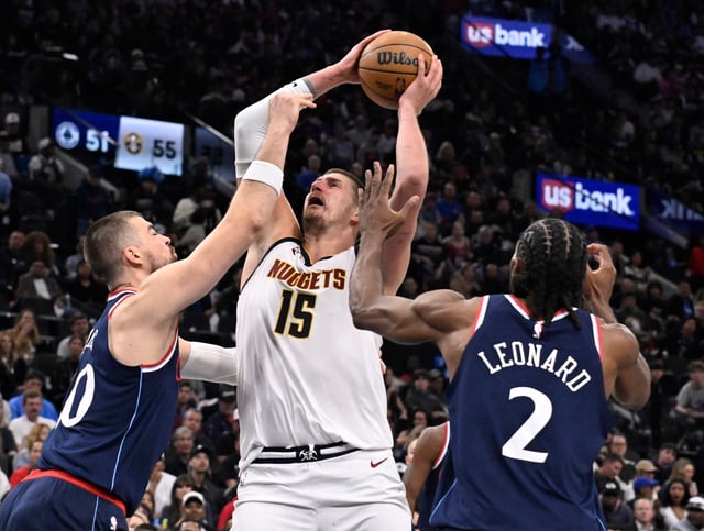 Denver Nuggets center Nikola Jokic drives to the basket as Clippers center Ivica Zubac, left, and teammate Kawhi Leonard, right, defend during the second half of Game 4 of their first-round playoff series on Saturday, April 26, 2025, at the Intuit Dome in Inglewood. (Photo by Keith Birmingham, Orange County Register/SCNG)