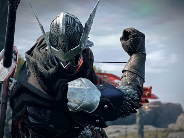 Nightreign knight holds his fist in menacing fashion