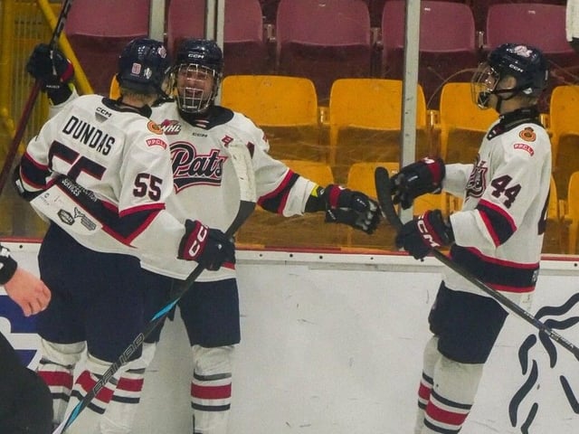 The Regina Pat Canadians celebrate after scoring a goal in round robin play at the 2025 Telus Cup.