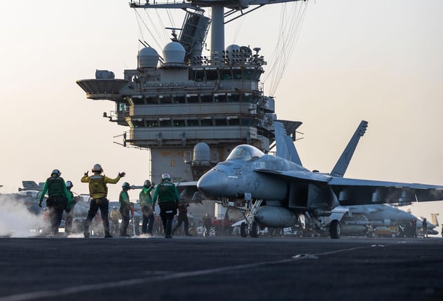 This April 1 photo from the US Navy shows a F/A-18E Super Hornet preparing for launch on the USS Harry S. Truman.