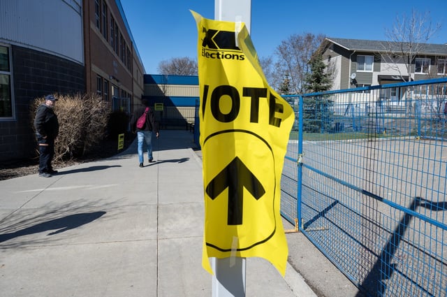 Voters make their way to a polling station to cast their vote in the Federal election in Saskatoon, SASK. on Friday, April 28, 2025. THE CANADIAN PRESS/Liam Richards