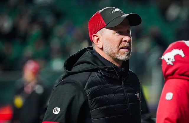 Calgary Stampeders head coach Dave Dickenson walks off the field at halftime of CFL football action against the Saskatchewan Roughriders in Regina, on Saturday, October 26, 2024. THE CANADIAN PRESS/Heywood Yu