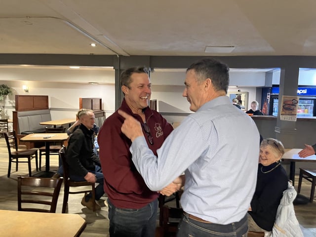  Malpeque Conservative candidate Jamie Fox, right, greets provincial Conservative MLA Brad Trivers at Sam’s Restaurant and Pub in Cornwall on April 28, where a small group of Fox’s supporters have gathered. Trivers said he’s on pins and needles tonight. “This one is different,” Trivers said.