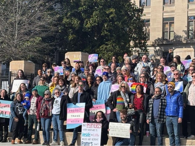 LGBTQ advocates and allies inside Liberty Plaza for the Stand Up for Trans Georgians Rally on January 13, 2025, in Atlanta, Georgia. (Photo credit: Darian Aaron)