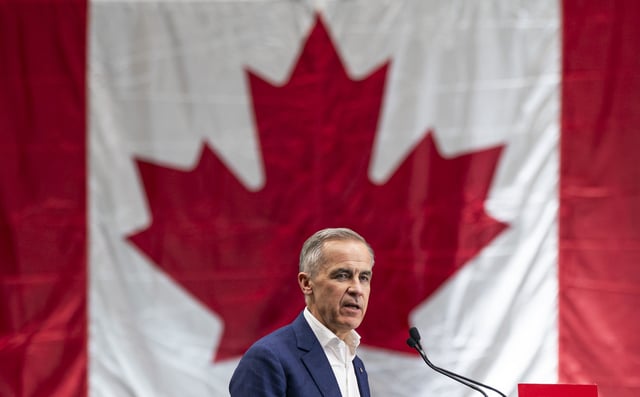 Prime Minister of Canada and Liberal Party Leader Mark Carney is seen delivering a speech to supporters during a rally on April 23, 2025, in Surrey, Canada. (Photo by Rich Lam/Getty Images)