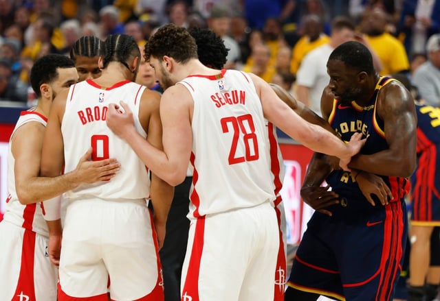Golden State Warriors’ Draymond Green (23) tries to listen in on a Houston Rockets huddle in the first quarter at the Chase Center in San Francisco, Calif., on Monday, April 28, 2025. (Nhat V. Meyer/Bay Area News Group)