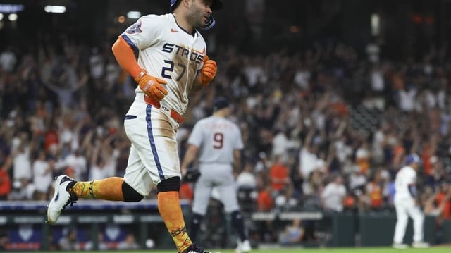 Apr 28, 2025; Houston, Texas, USA; Detroit Tigers starting pitcher Jack Flaherty (9) looks up and Houston Astros left fielder Jose Altuve (27) rounds the bases after hitting a home run during the sixth inning at Daikin Park. Mandatory Credit: Troy Taormina-Imagn Images