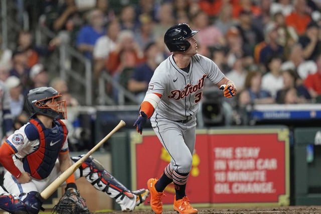 Detroit Tigers&#39; Kerry Carpenter (30) drops his bat after hitting a two-run home run as Houston Astros catcher Yainer Diaz watches during the third inning of a baseball game Monday, April 28, 2025, in Houston. (AP Photo/David J. Phillip)