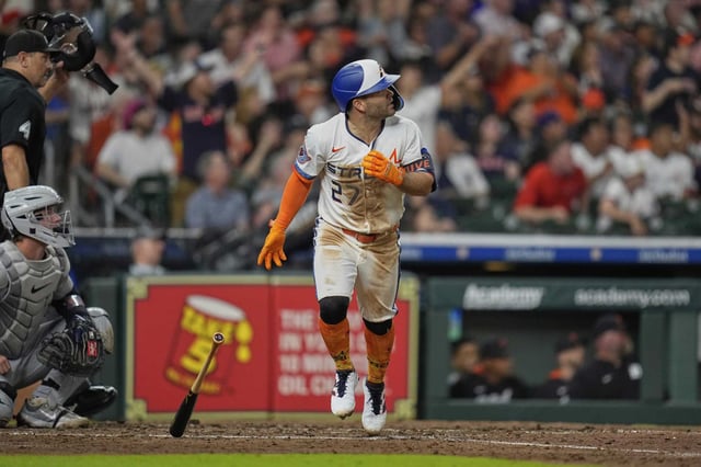 Houston Astros&#39; Jose Altuve (27) drops his bat after hitting a two-run home run against the Detroit Tigers during the sixth inning of a baseball game Monday, April 28, 2025, in Houston. (AP Photo/David J. Phillip)