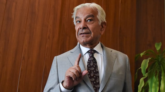 Pakistan’s defence minister Khawaja Muhammad Asif gestures on the day of an interview with Reuters in Islamabad, 