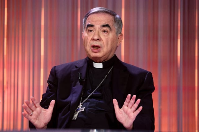 Cardinal Angelo Becciu, who was convicted of embezzlement and fraud and sentenced to five-and-a-half years in jail, gestures during the taping of the television talk show "Cinque minuti" (Five minutes) in Rome, Italy, December 18, 2023. REUTERS/Guglielmo Mangiapane/File Photo