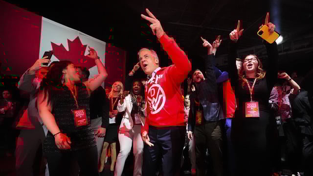 Canadian Prime Minister Mark Carney, center, dances to Canadian band Down With Webster as they play live from campaign headquarters after the Liberal Party won the Canadian election in Ottawa on Tuesday, April 29, 2025. (Sean Kilpatrick/The Canadian Press via AP)
