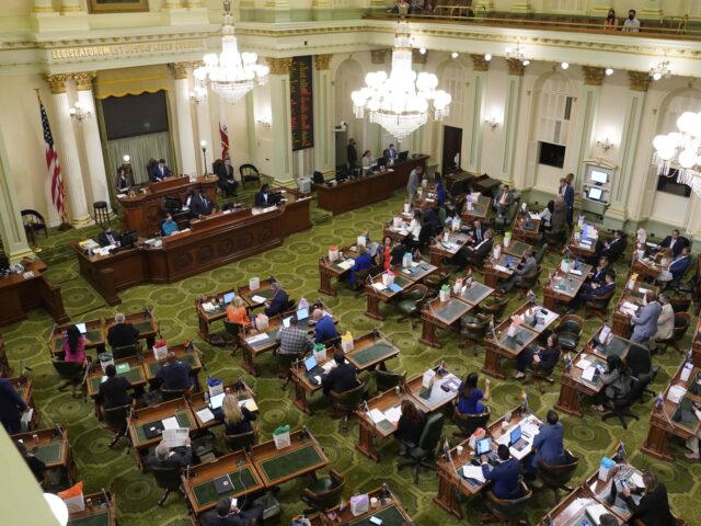 FILE - Members of the California state Assembly meet at the Capitol in Sacramento, Calif., Monday, June 20, 2022. An unusually hight number of California lawmakers will be gone after the Tuesday, Nov. 8, 2022, election. A quarter of the 40-member Senate is being replaced and 22 members of the 80 member Assembly will be leaving, but the Democrats' overwhelming majorities in both chambers are expected to be safe. (AP Photo/Rich Pedroncelli, File)