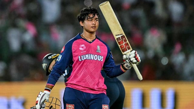 Rajasthan Royals batter Vaibhav Suryavanshi, 14, celebrates after becoming the youngest to score a century in IPL, and the second fastest to triple figures, against Gujarat Titans in Jaipur on Monday. (AFP)