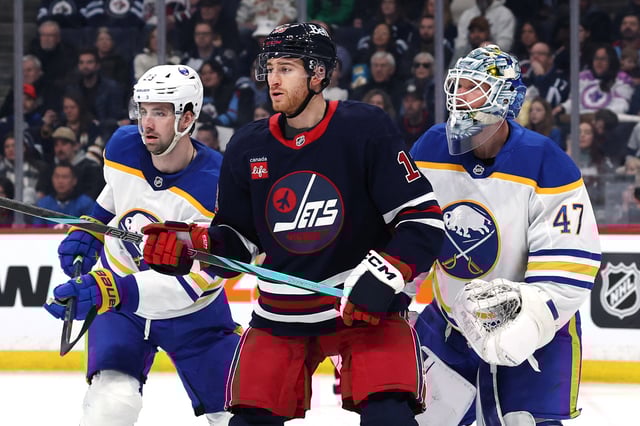 Mar 23, 2025; Winnipeg, Manitoba, CAN; Buffalo Sabres defenseman Mattias Samuelsson (23), Winnipeg Jets center Gabriel Vilardi (13) and Buffalo Sabres goaltender James Reimer (47) wait for an incoming shot in the second period at Canada Life Centre. Mandatory Credit: James Carey Lauder-Imagn Images/File Photo