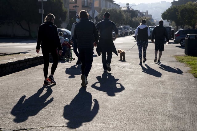 Pedestrians walk along a path near Marina Boulevard in San Francisco. Medical experts say the viral “fart walk” after meals can aid digestion, regulate blood sugar and boost overall health.