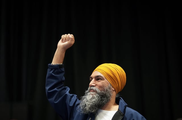NDP Leader Jagmeet Singh gestures as he's introduced to delegates during a campaign stop at the Ontario Public Service Employees Union annual convention, in Toronto, Friday, April 25, 2025. THE CANADIAN PRESS/Darryl Dyck