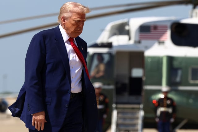 U.S. President Donald Trump walks to board Air Force One as he departs for Michigan to attend a rally to celebrate his first 100 days in office, at Joint Base Andrews in Maryland, U.S., April 29, 2025. REUTERS/Evelyn Hockstein