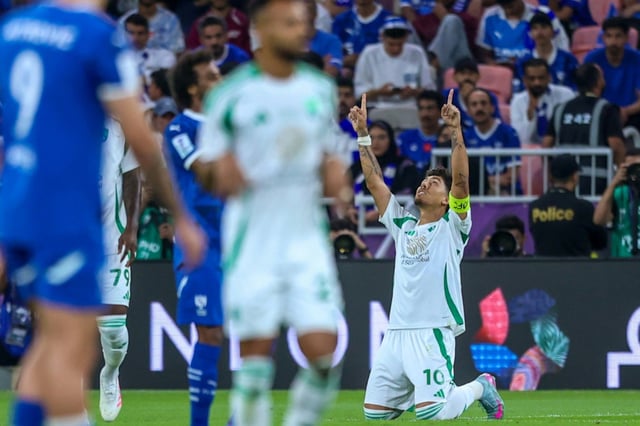 Al Ahli's Brazilian forward Roberto Firmino celebrates afer scoring