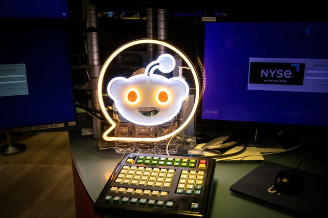 Reddit Inc. signage during the company's initial public offering on the floor of the New York Stock Exchange in New York on March 21, 2024. 