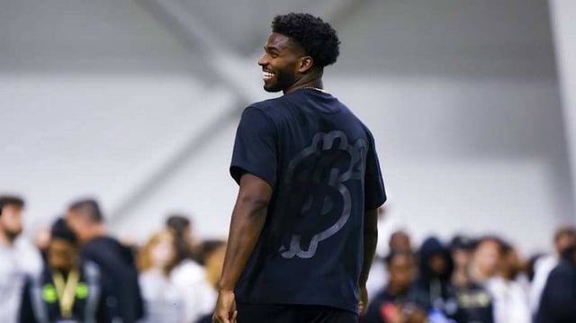 Apr 4, 2025; Boulder, CO, USA; Colorado Buffaloes quarterback Shedeur Sanders (2) laughs during the University of Colorado NFL Showcase at the CU Indoor Practice Facility. Mandatory Credit: Michael Ciaglo-Imagn Images