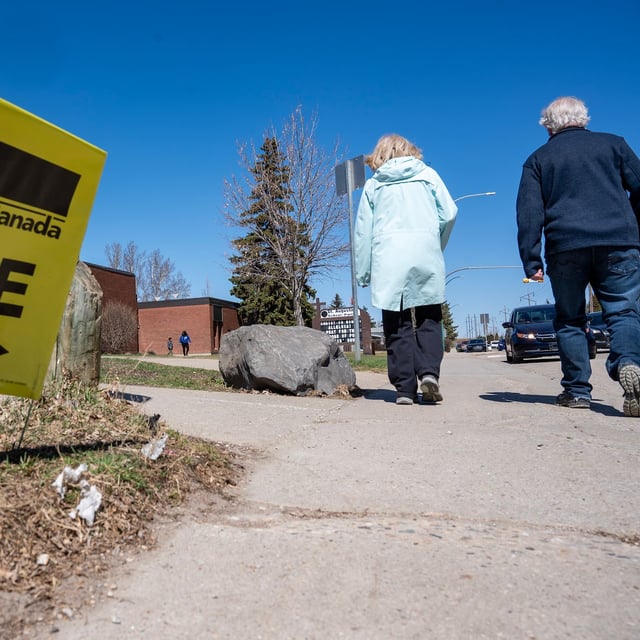 Voters make their way to a polling station to cast their vote in the Federal election in Saskatoon, SASK. on Friday, April 28, 2025. THE CANADIAN PRESS/Liam Richards