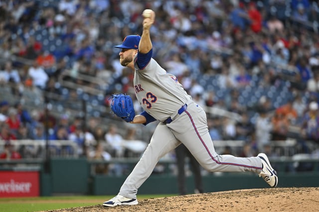 Apr 26, 2025; Washington, District of Columbia, USA; New York Mets pitcher A.J. Minter (33) throws to the Washington Nationals during the eighth inning at Nationals Park. Mandatory Credit: Brad Mills-Imagn Images/File Photo