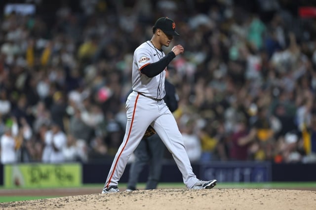SAN DIEGO, CALIFORNIA – APRIL 29: Randy Rodríguez #73 of the San Francisco Giants reacts after allowing a two-run homerun to Xander Bogaerts #2 of the San Diego Padres during the seventh inning of a game at Petco Park on April 29, 2025 in San Diego, California. (Photo by Sean M. Haffey/Getty Images)