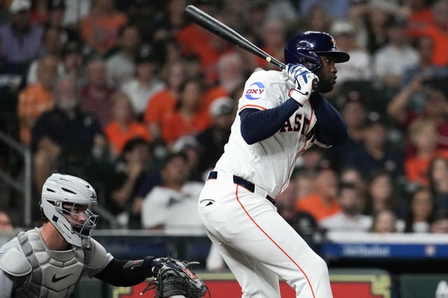 Houston Astros designated hitter Yordan Alvarez (44) connects for an RBI single in the seventh inning of a MLB baseball game at Daikin Park in Houston, Tuesday, April 29, 2025.