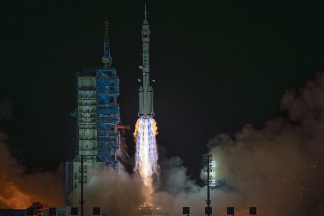 FILE -Shenzhou-19 spacecraft sitting atop a Long March rocket takes off from the Jiuquan Satellite Launch Center in Jiuquan, northwestern China in the early hours of Oct. 30, 2024. (AP Photo/Ng Han Guan, File)