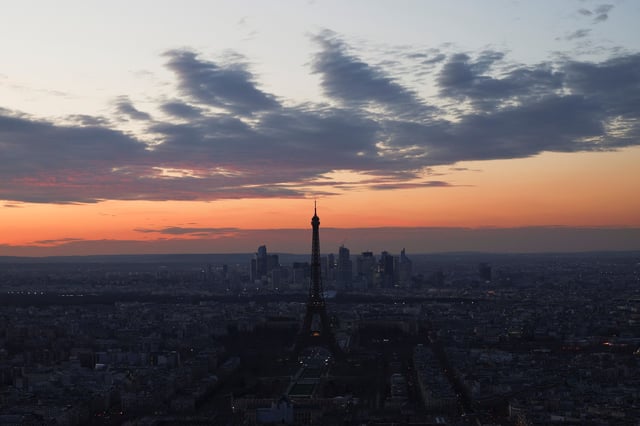 General view of the Eiffel Tower and the Paris skyline at sunset from the Montparnasse Tower in Paris, France, March 19, 2025. REUTERS/Abdul Saboor/File Photo